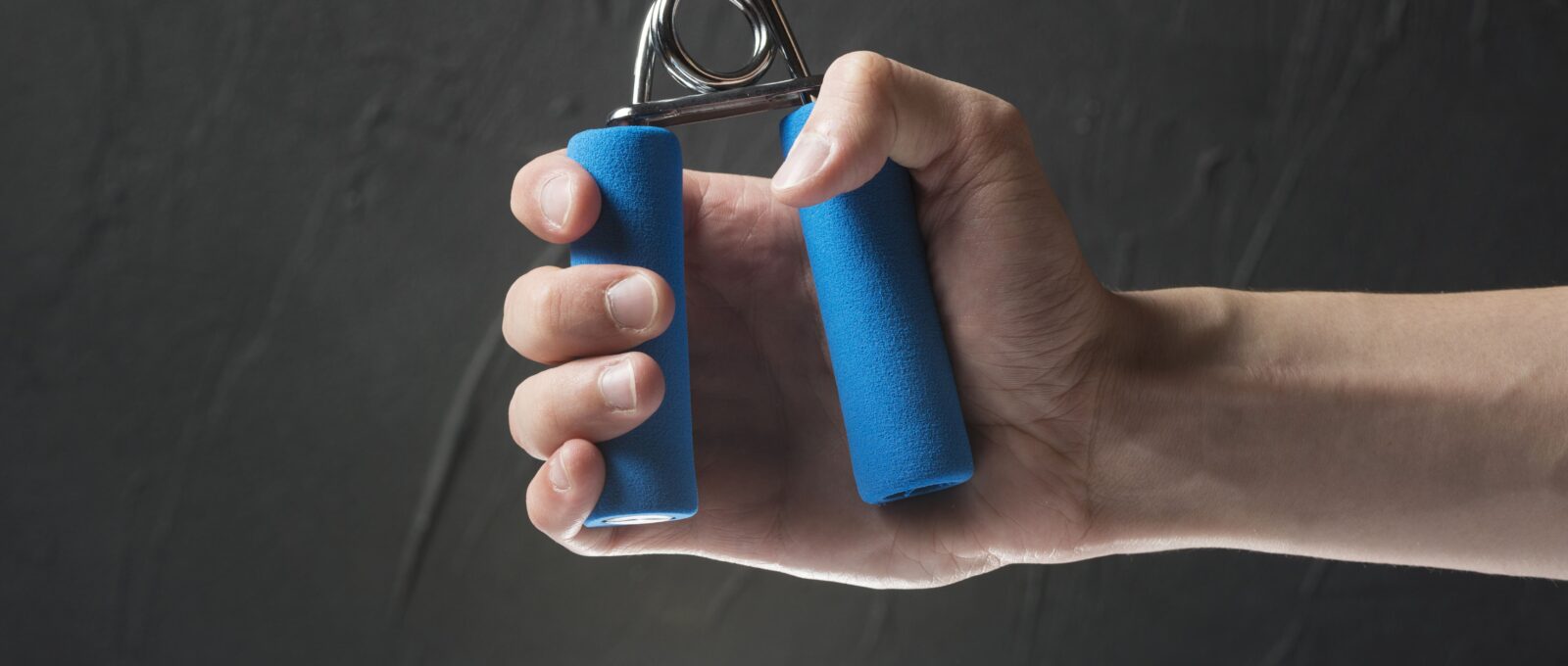 person testing his grip strength