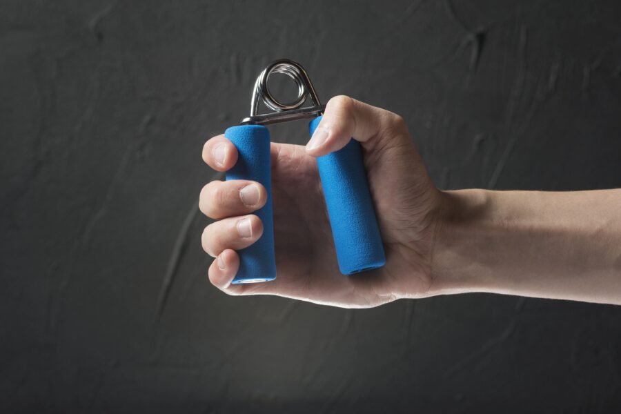 person testing his grip strength